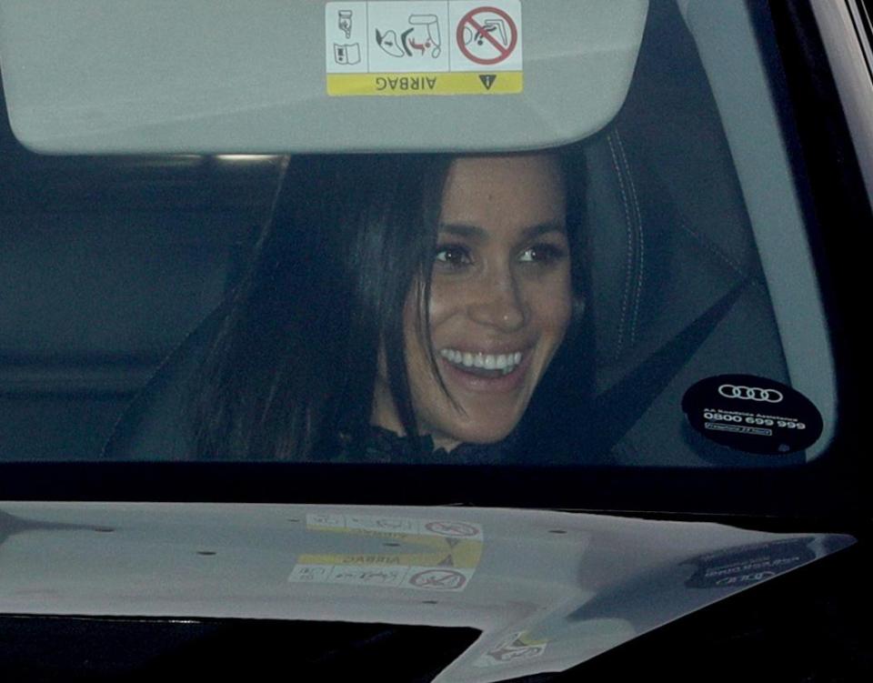  Meghan Markle beamed as she left the Royal lunch