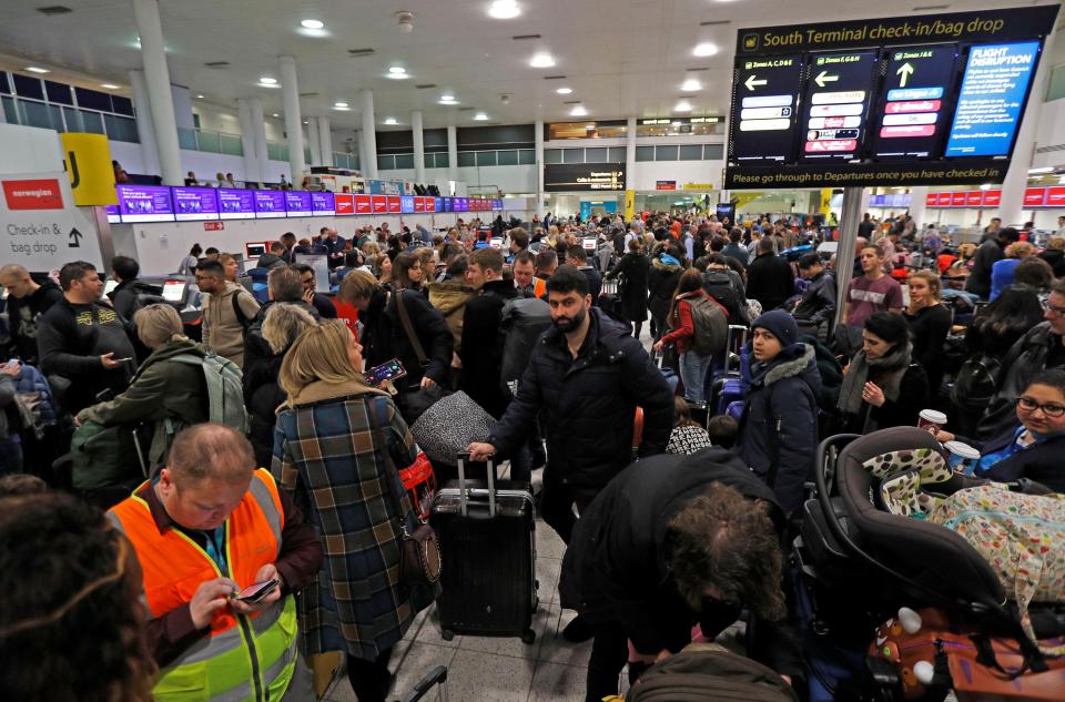  Passengers waiting around in Gatwick Airport after it was closed this morning due to drones being dangerously flown in the area