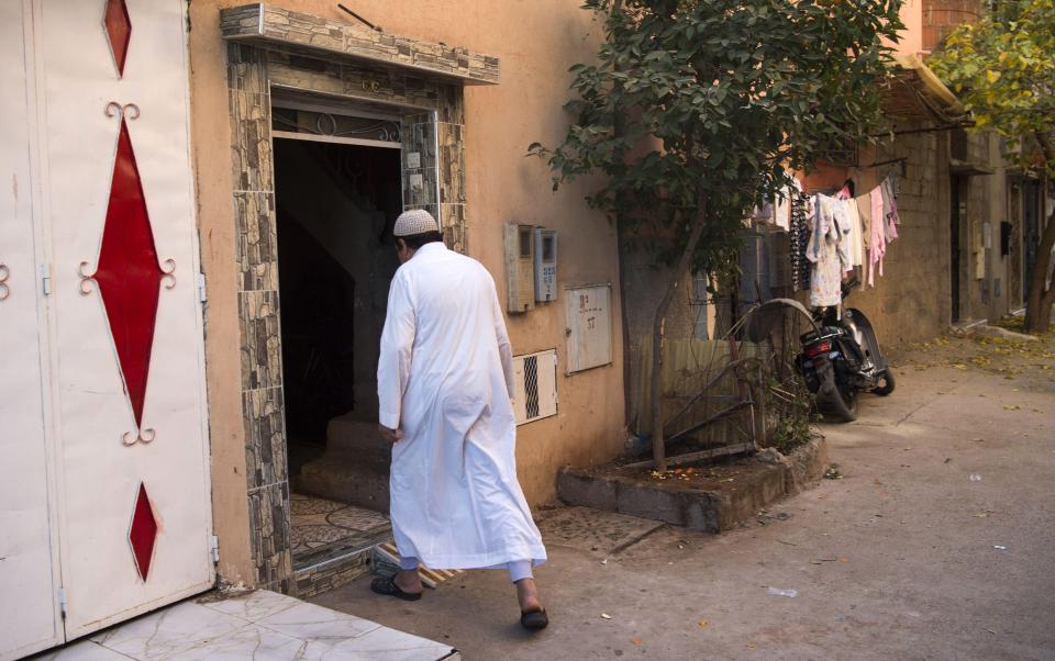  Ouaziad's father entering his house in Marrakesh earlier today