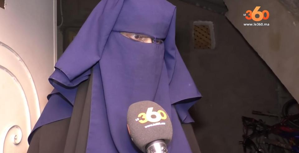  Ouaziad's wife, who chose not to be named, speaking to Moroccan press from the suspect's home