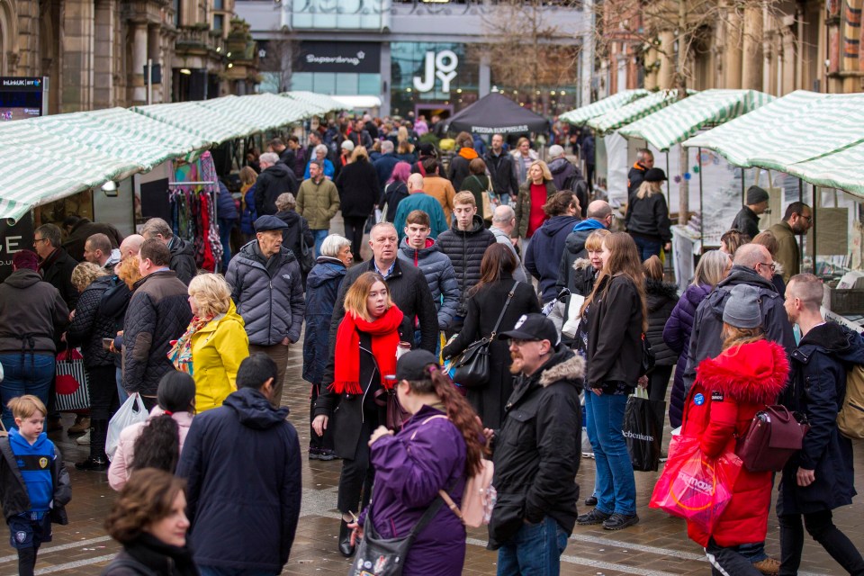 Shoppers in Leeds race the get their last-minute Christmas gifts