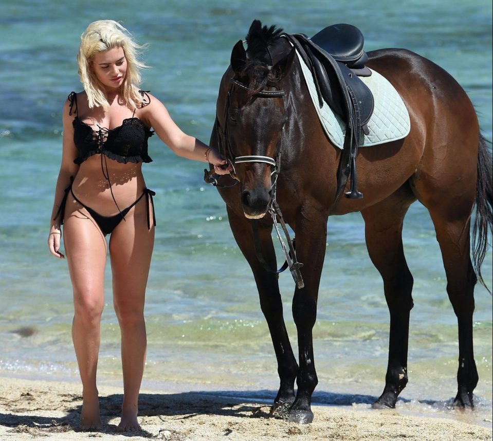  Megan and her equine pal seemed to be bonding as they walked in the water