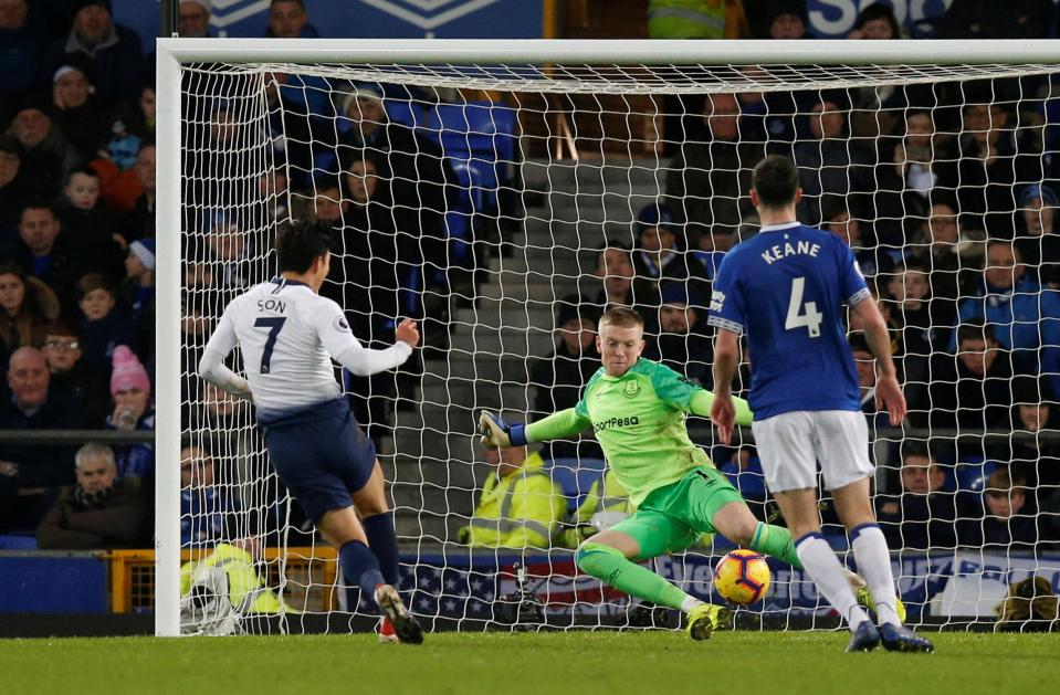  Slotting one past Jordan Pickford