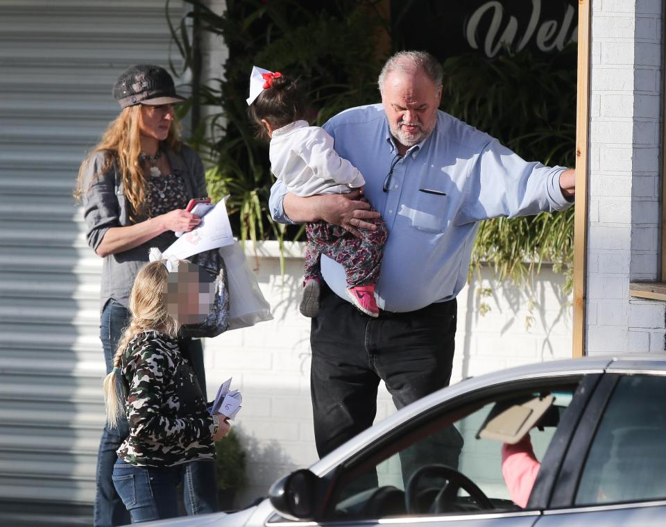  Thomas Markle was pictured giving a helping hand to give refugee children a good Christmas