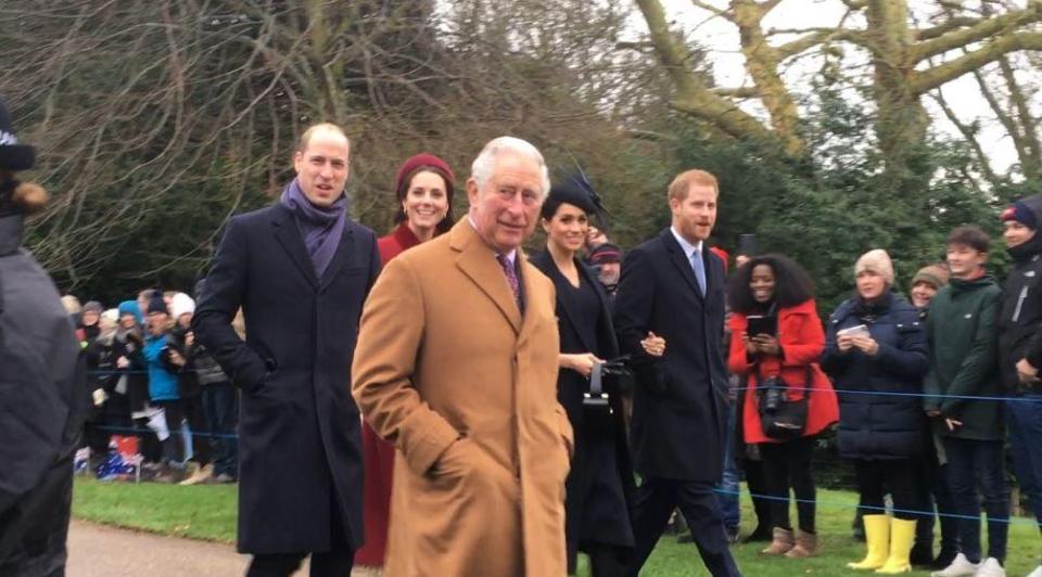  The royals wrapped up against the cold to greet the waiting crowds