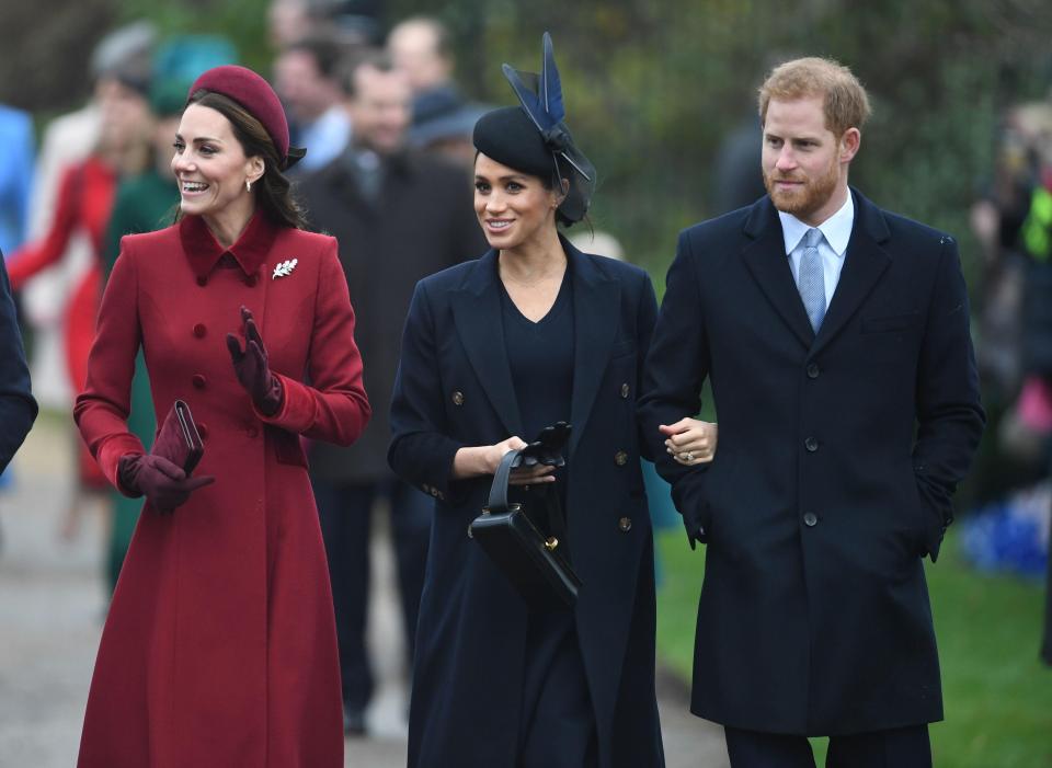  Kate wore a festive red coat and headband