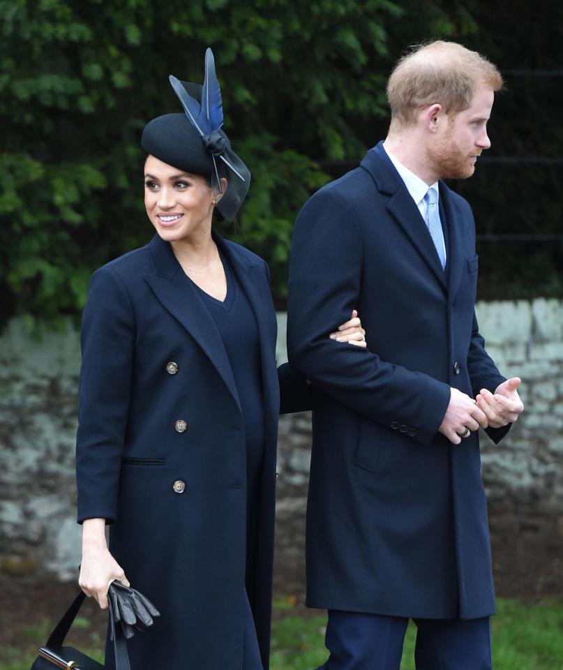  Meghan Markle clutches Harry's arm as newlyweds walk lovingly through Norfolk