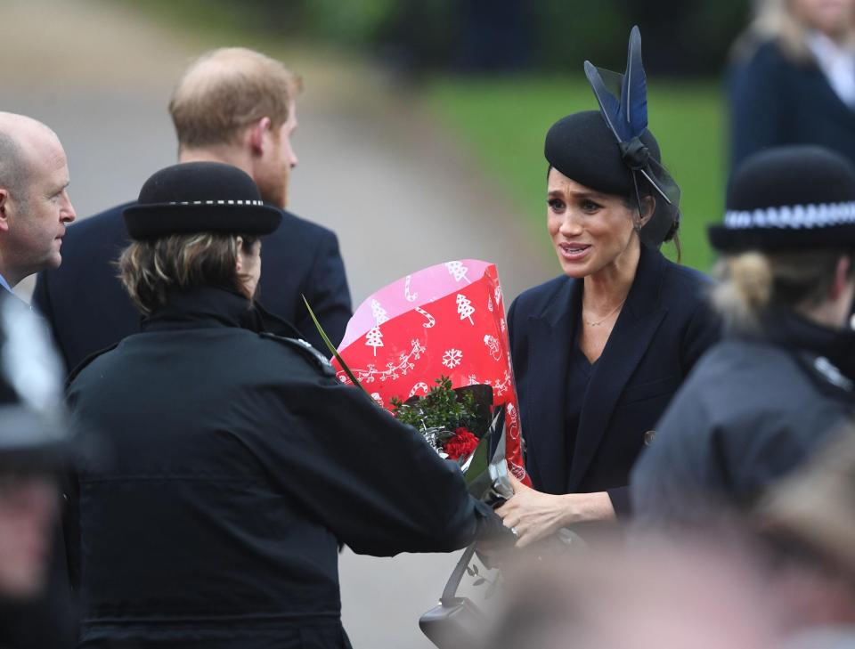  She looked thrilled to be handed flowers