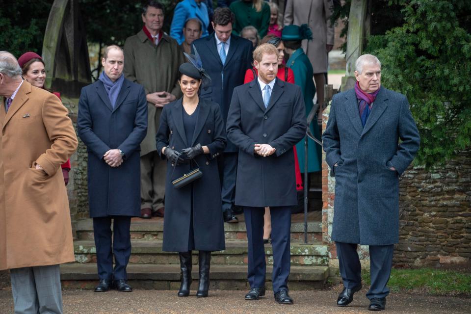  Prince William and Prince Andrew pictured alongside Harry and Meg after church service