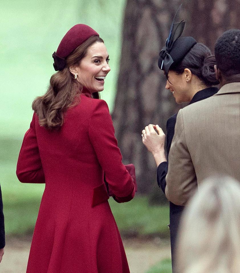  Kate and Meghan appear to share a joke and chat after the royals attend Christmas Church service