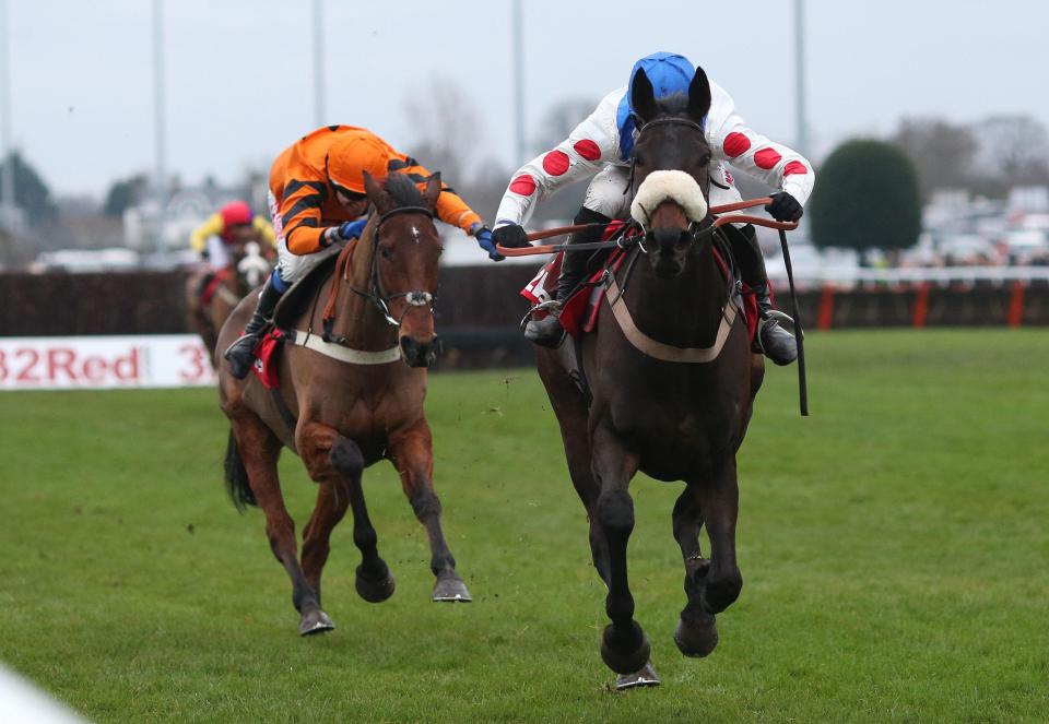  Clan Des Obeaux pricks his ears under jockey Harry Cobden as they land the King George