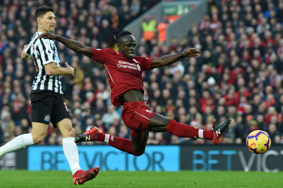  Sadio Mane stretches for the ball in front of the Anfield crowd