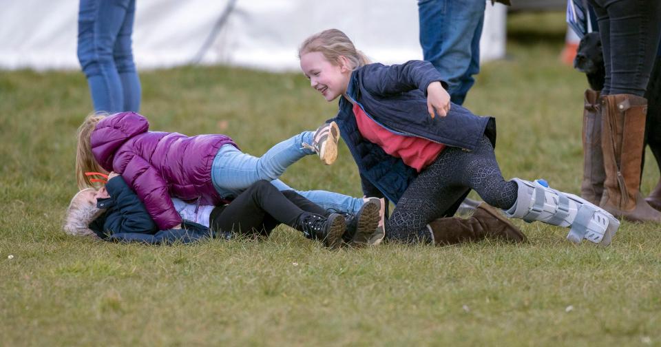  Mia Tindall and cousins Savannah and Isla were spotted play-fighting at the Gatcombe Horse Trials in Gloucestershire in March