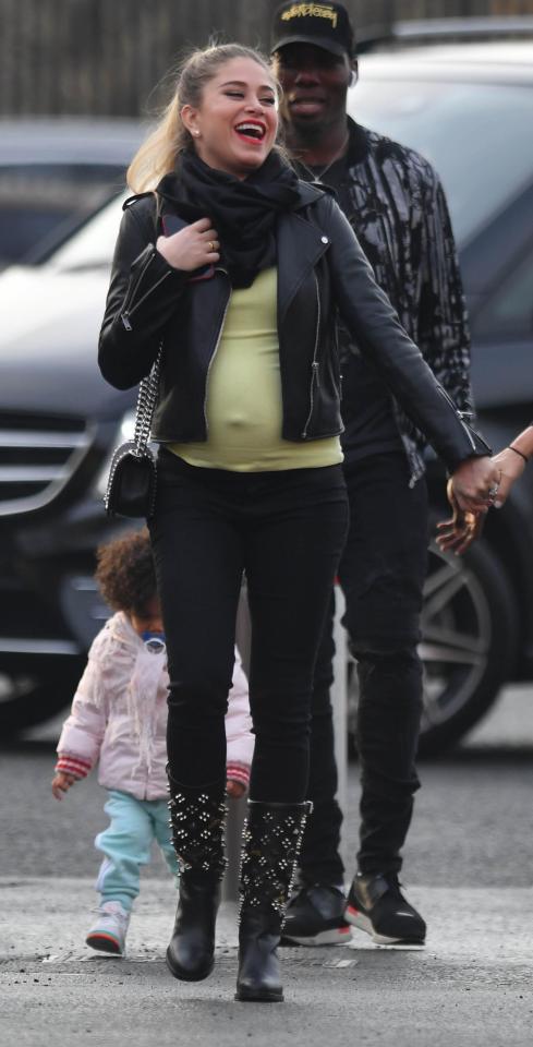  Paul Pogba's stunning girlfriend Salaues watched him net twice against the Terriers at Old Trafford