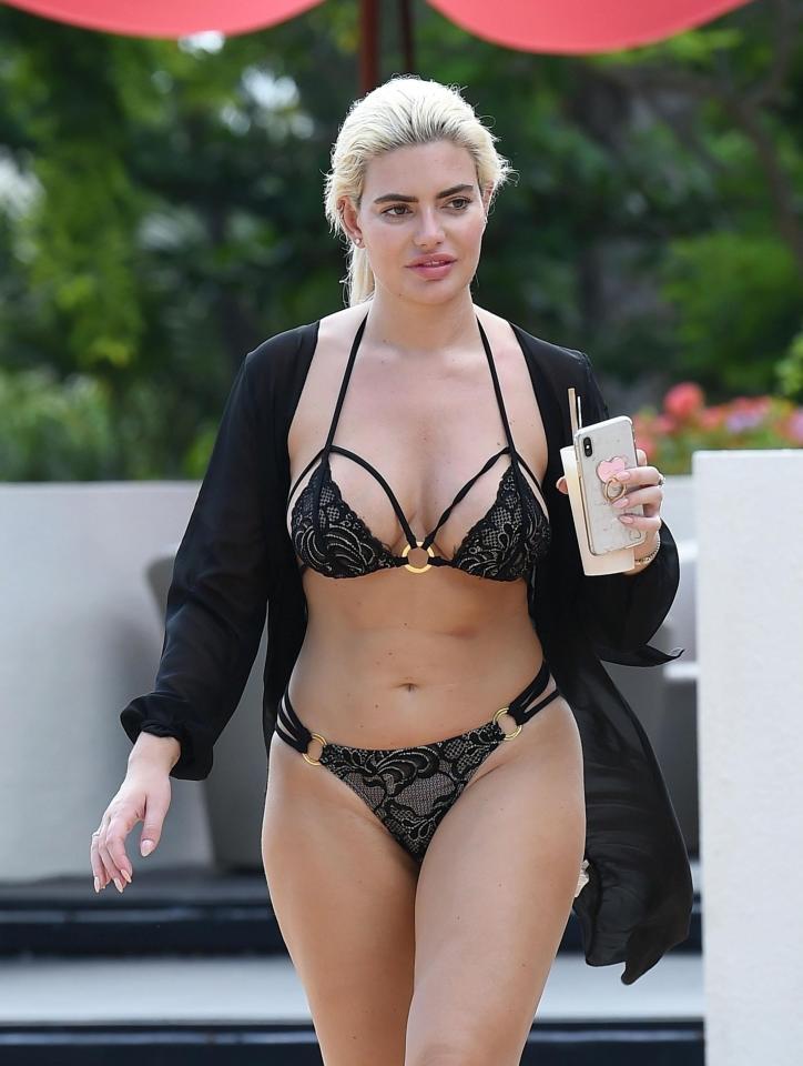  The TV star looked incredible in a black lace, strappy bikini