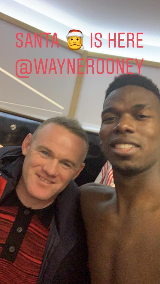  Paul Pogba wrote 'Santa is here' as Wayne Rooney visited the team's changing room