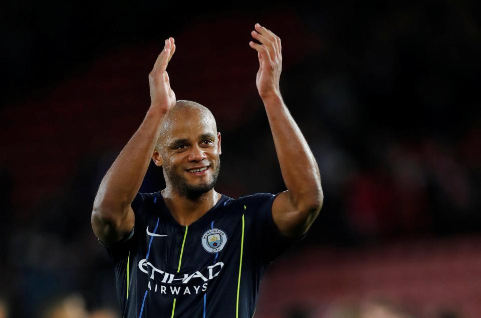  City skipper Vincent Kompany celebrates his team's win