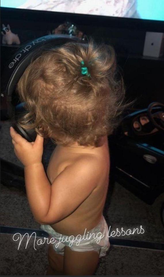  Cheryl Tweedy shared rare pictures of her son Bear listening to music today