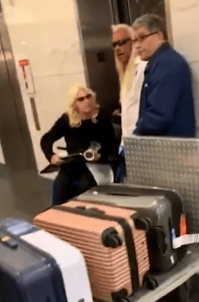  The reality TV star was with his cancer-stricken wife, who passed through the airport in a wheelchair