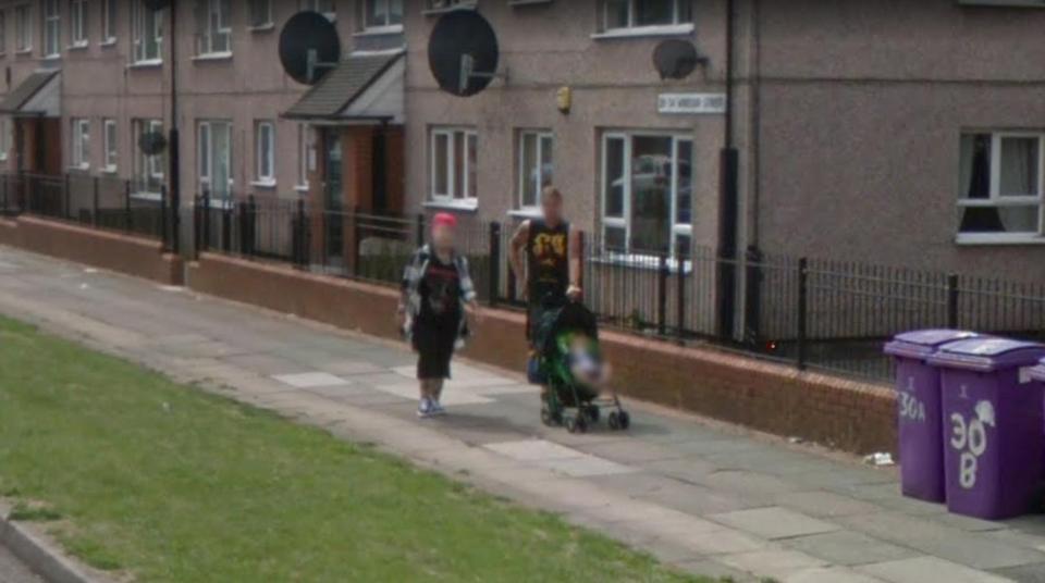  The two passersby were snapped pushing a young child sitting in a pram