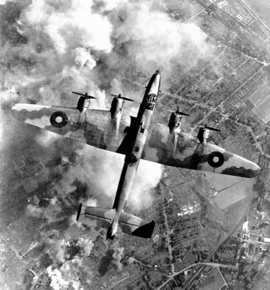  A Halifax from Bomber Command attacks an oil plant in Germany's industrial Ruhr region