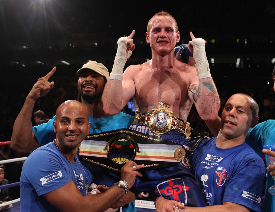  George Groves celebrates his win over James DeGale at the O2 Arena in London