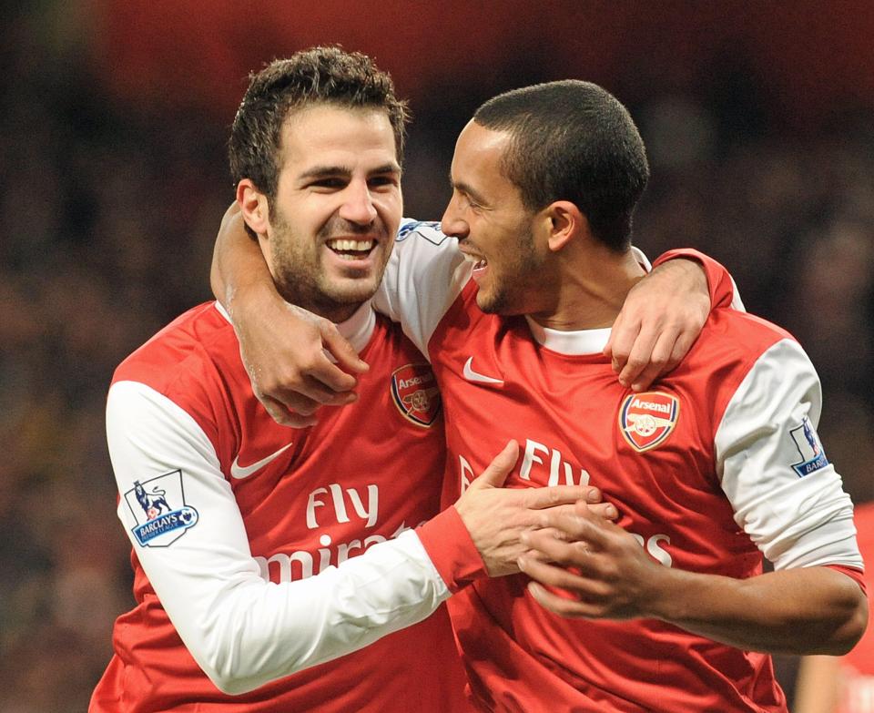  Fabregas (l, with Theo Walcott) was a popular player at Arsenal and captained the side from late 2008