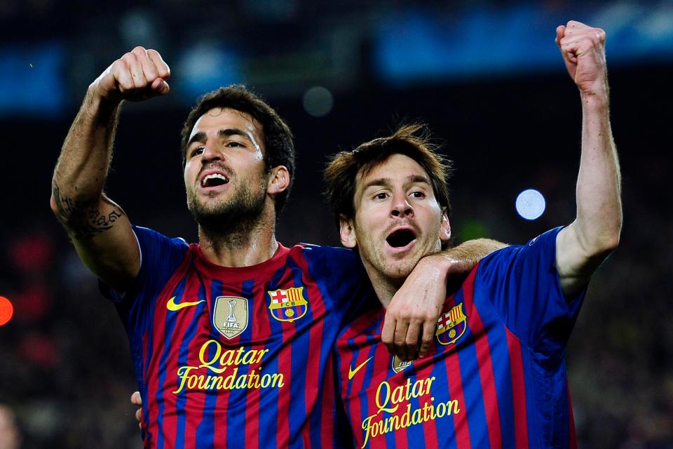  Fabregas (l, with Lionel Messi) spent three years at Barcelona before returning to England in 2014