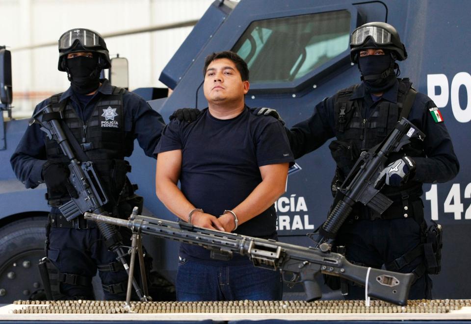 Suspected Jalisco New Generation leader Radillo Peza is paraded before the press in 2012