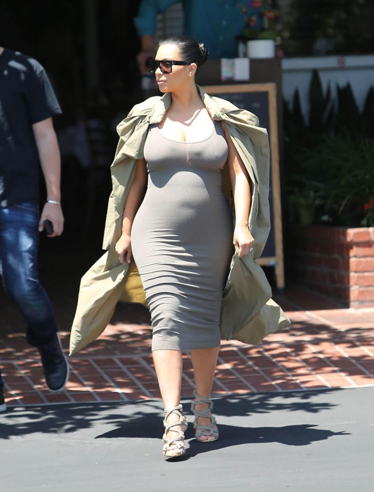  Kim is a fan of the fitted maternity midi