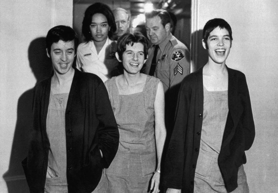 Susan Denise Atkins, left, Patricia Krenwinkel and Leslie Van Houten, right, laugh after receiving their sentences at the order of Charles Manson