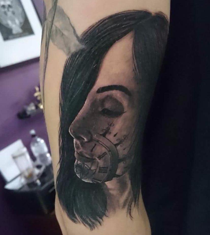  After Millie forgave John over an alleged fling he pledged his love with a tattoo of her face