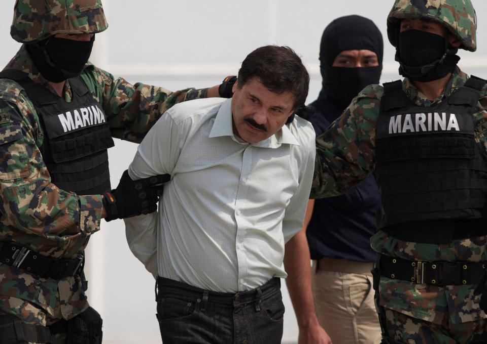 El Chapo, pictured during his arrest, once rivalled Pablo Escobar for his power and control of the international drugs trade