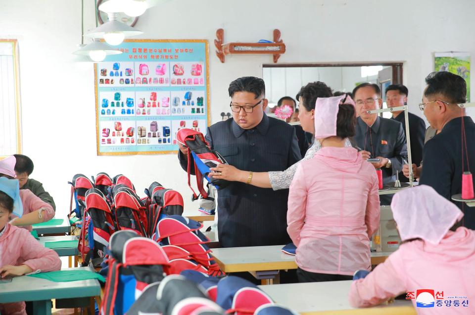  Kim Jong-un during a visit to a bag factory in January 2017