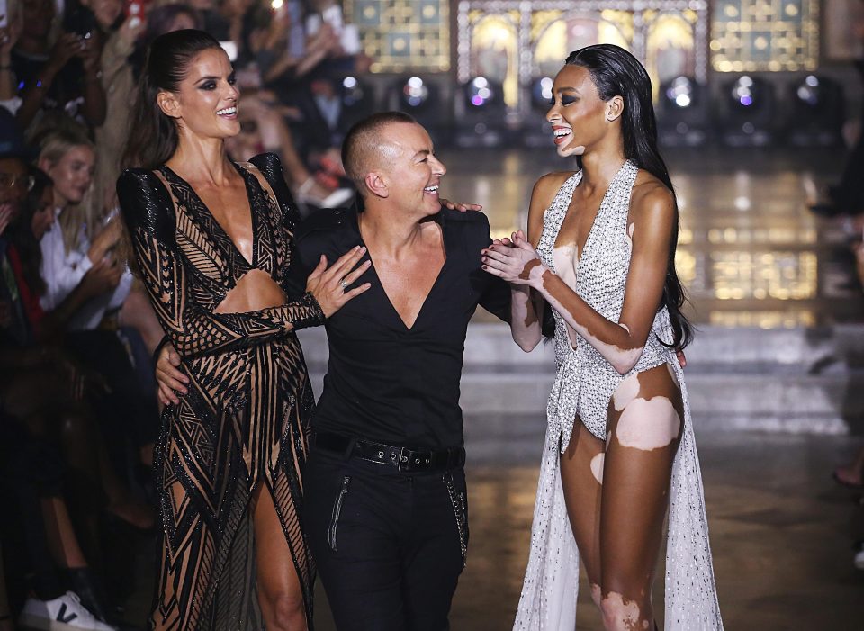  Designer Julien Macdonald poses with Izabel Goulart and Winnie Harlow at the last LFW in September 2018