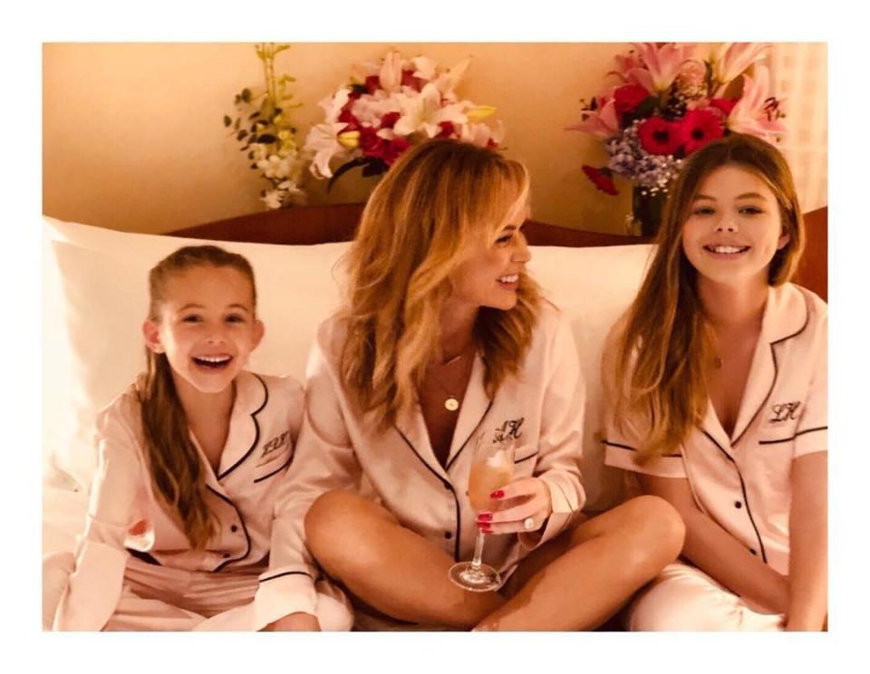  Amanda with her two daughters Hollie, 6, and Lexie, 12