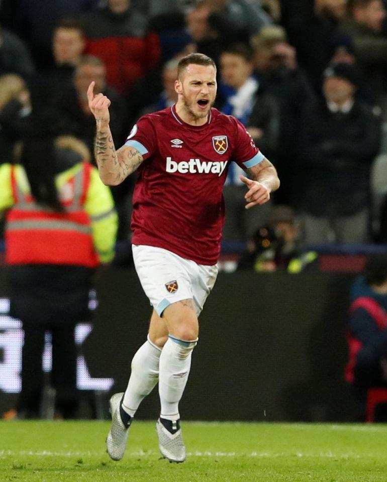  Marko Arnautovic celebrates his match-saving double for West Ham at home to Brighton