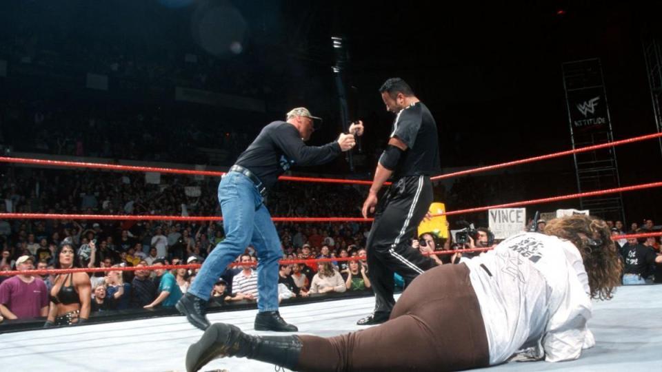  The Texas Rattlesnake helped Mankind to defeat The Rock to become champ for the first time