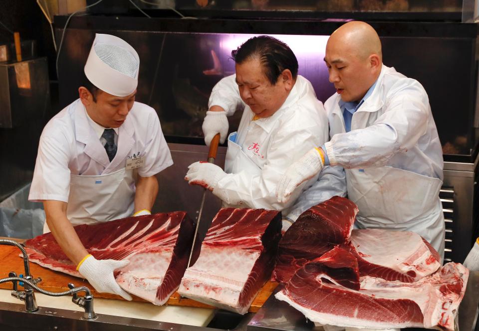  The restaurant owner was later pictured filleting the fish at his restaurant