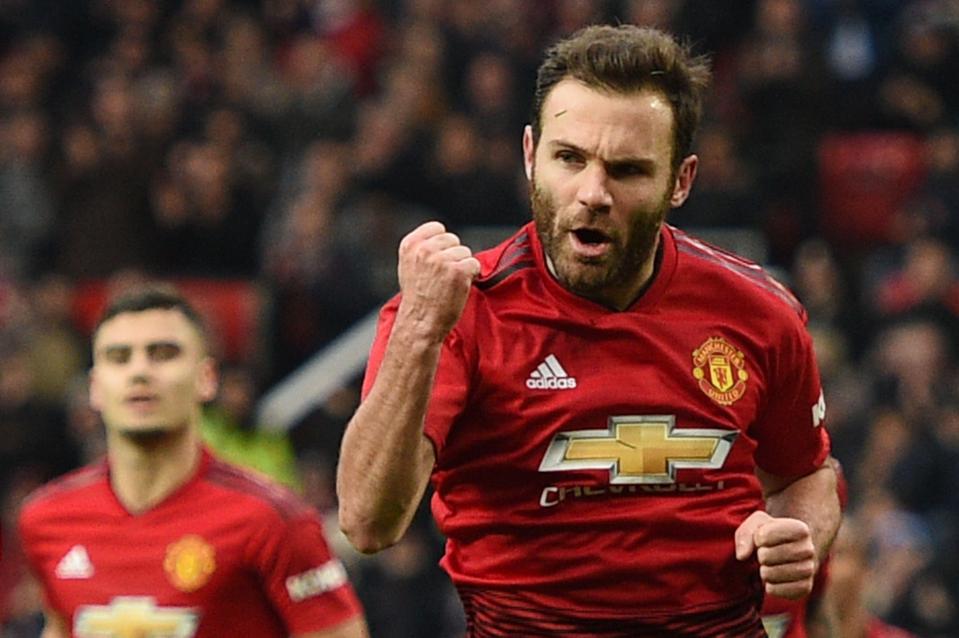  Juan Mata celebrates his penalty which opened the scoring midway through the first half