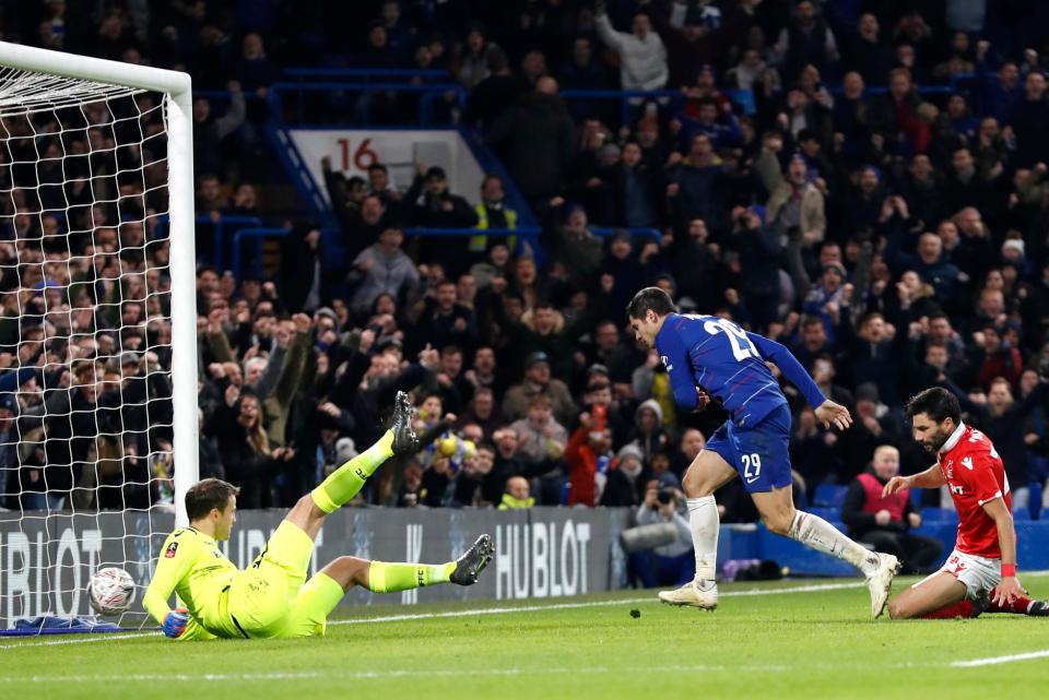  Morata tucked in his first goal of the game at Stamford Bridge