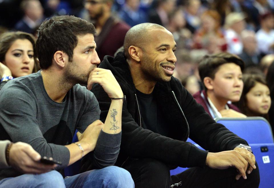  Cesc Fabregas and Thierry Henry at an NBA game at the O2 in 2015