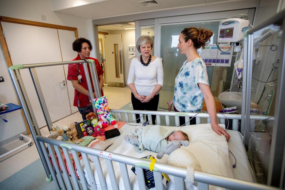  Meanwhile Theresa May went to a nearby hospital to launch her NHS plans yesterday