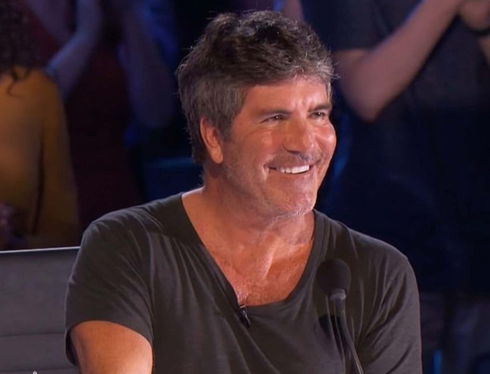 AGT boss Simon Cowell looks chuffed to bits as his BGT star triumphs all over again on the US version