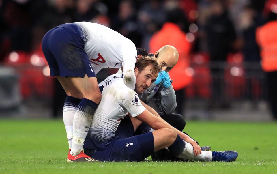  An exasperated Kane needed help off the pitch following the 1-0 defeat to Man Utd at Wembley