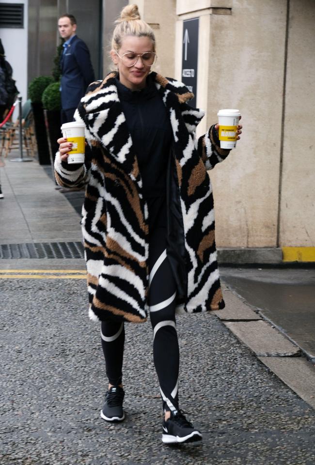  Ashley was seen carrying coffees as she made her way to the Arena Birmingham