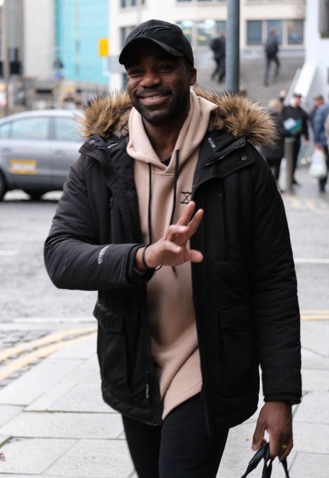  Ore Oduba wrapped up in a stylish parka jacket