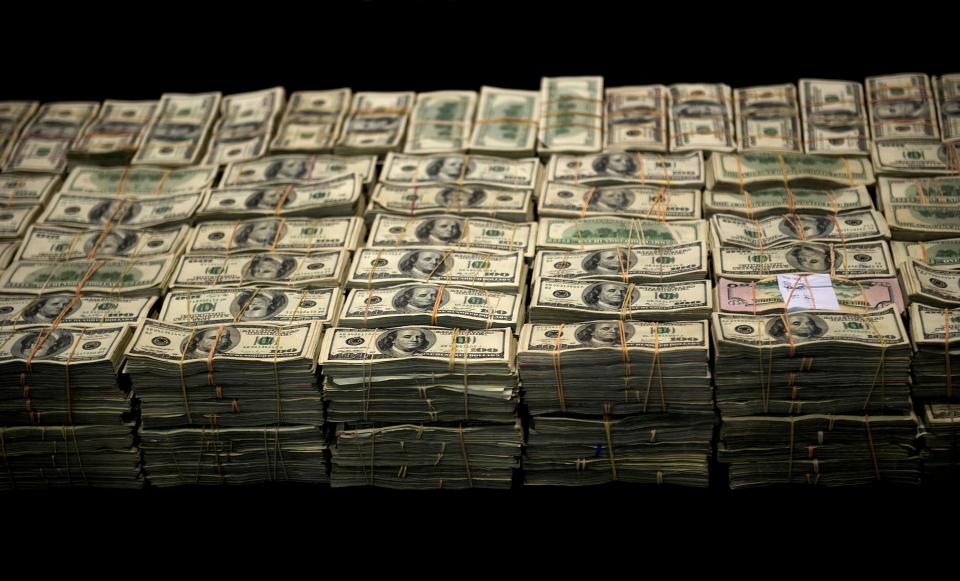 Pictured are bank notes forming part of a seizure of more than 15million US dollars belonging to the Sinaloa cartel