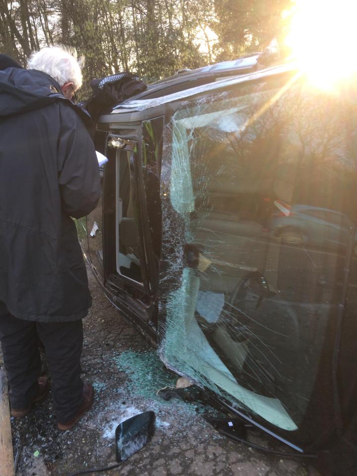  The Prince's car seen lying on its side with a shattered windscreen