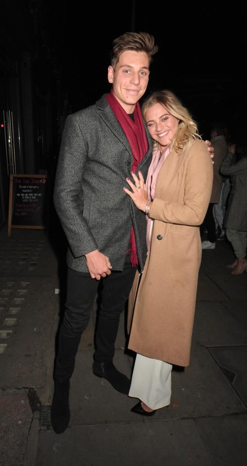  The couple looked smitten as they headed out together